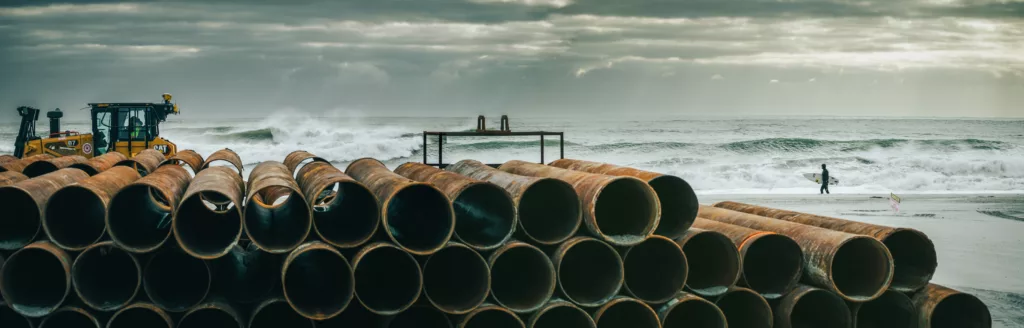 panoramic photo of surf and construction with waves. cool desktop image